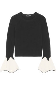 Bethenny Frankel S Black Sweater With White Bell Cuffs Big Blonde Hair