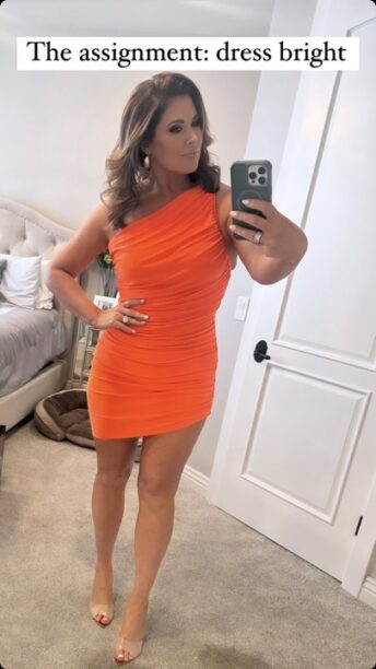 Emily Simpson's Orange One Shoulder Dress