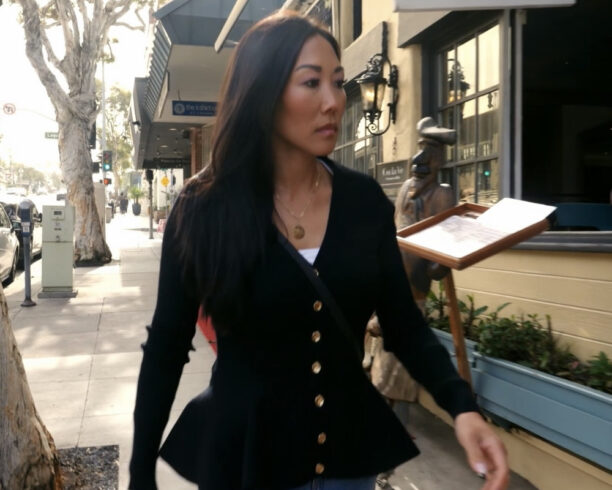 Katie Ginella's Black Peplum Cardigan